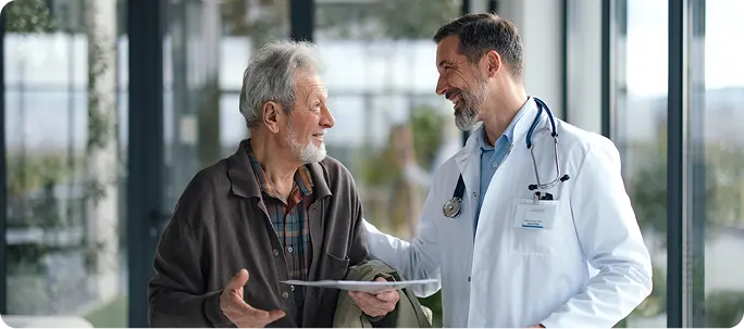 A doctor and patient reviewing visit details together