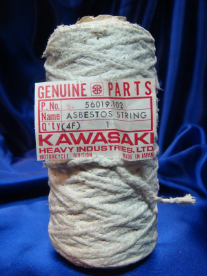 a spool of yarn made from asbestos fibers