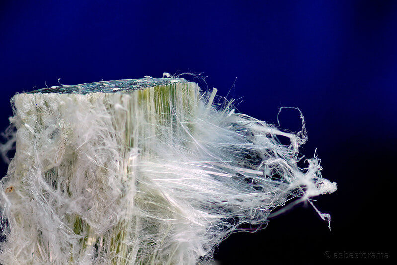 fibers separating from chunk of asbestos mineral ore