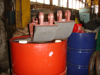 View of two brake pads for large crane equipment.