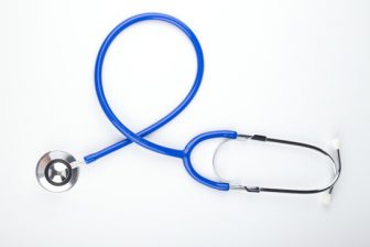 Blue stethoscope shaped like awareness ribbon