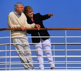 Happy older couple on cruise deck