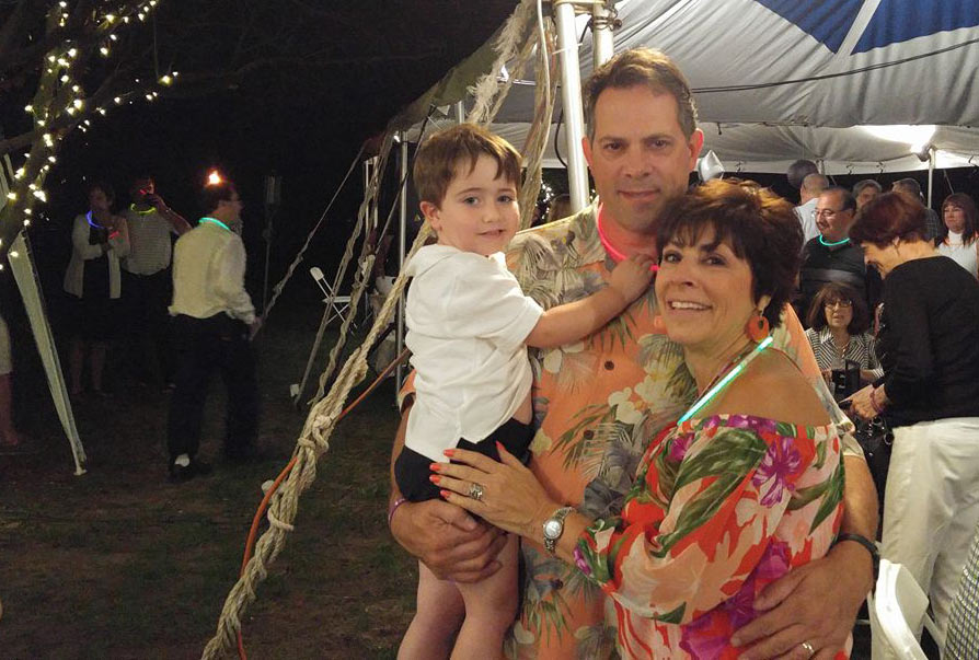 Darlene Micciche with her husband, Mike, and grandson, Camden, at Darlene's 60th birthday party.