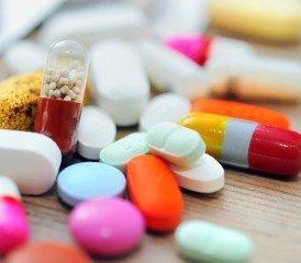 Several multicolored pills and tablets