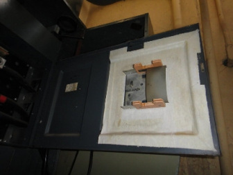 Asbestos electrical paper on fuse box door