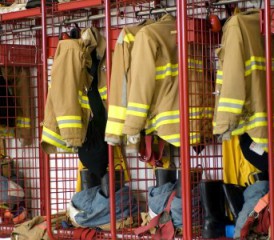 Firefighter jackets hanging in a locker