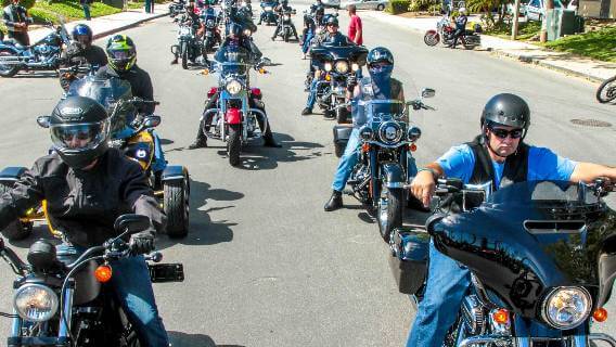 Motorcycle riders in a line