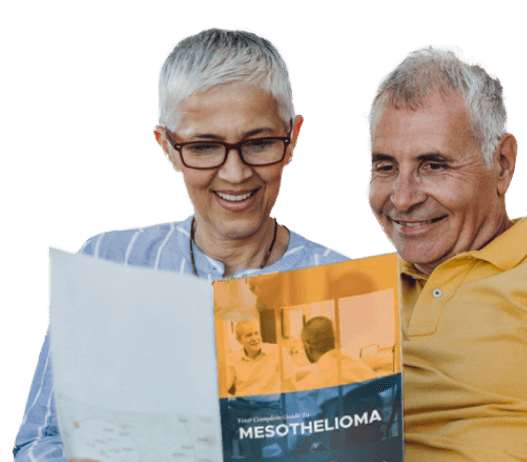Elderly couple reading The Mesothelioma Guide