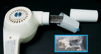 Asbestos-containing hair dryer
