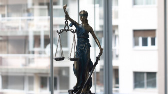 Justice figure with scale