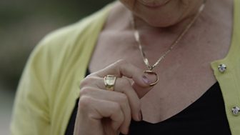 Lorraine Kember holding her wedding ring