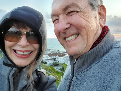 Maryla and Terry Latham take an outdoor selfie.