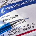 Medicare card with pen
