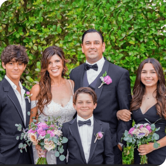 Missy Miller with family on her wedding day