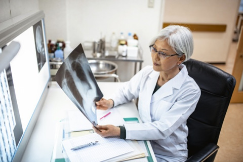 Physician Studying X-Ray