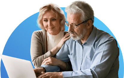 Couple reviewing information on laptop together