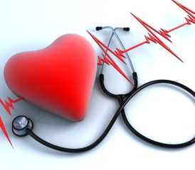 Red heart with stethoscope and EKG in background