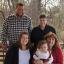 Mesothelioma survivor Tammy Frank (bottom right) and family