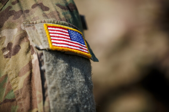 Army fatigue sleeve with American flag patch