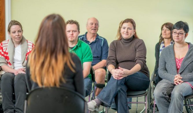 Group of Adults Participating in a Therapy Session