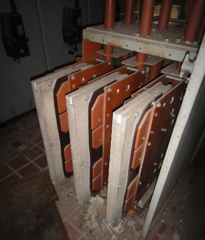 Asbestos barriers in electrical panel