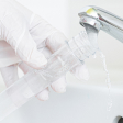 Test tube being filled with tap water