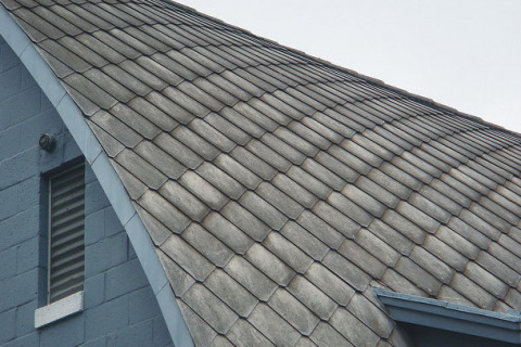 Asbestos cement roof tiles