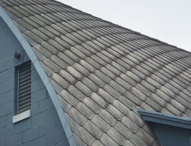 Asbestos cement roof tiles