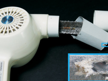 Hair dryer containing asbestos