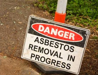 Danger sign, asbestos removal in progress