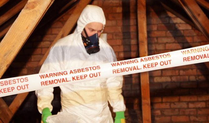 Man removing asbestos