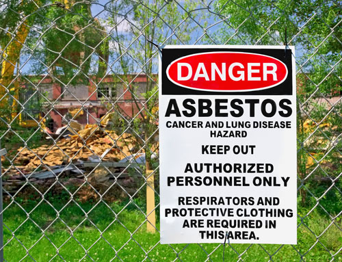 Asbestos warning outside of an abatement