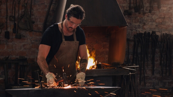 Blacksmith working with hot metal