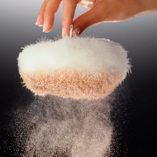 Cosmetic powder on puff