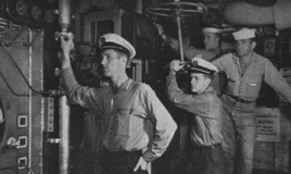 Servicemen working in boiler room