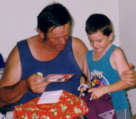 Brian Kember and his grandson Kam at Christmas