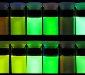 Glowing green cancer dyes in bottles