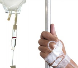 Man's hand with chemotherapy IV