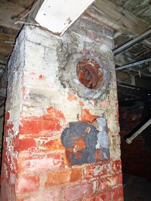 Brick chimney with asbestos cement