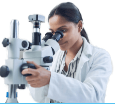scientist looking at microscope