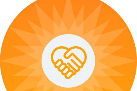 Round orange partnership logo with clasped hands