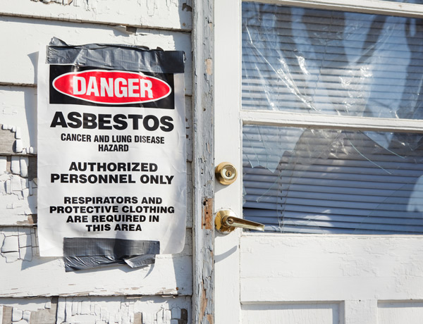 Condemned home with asbestos warning