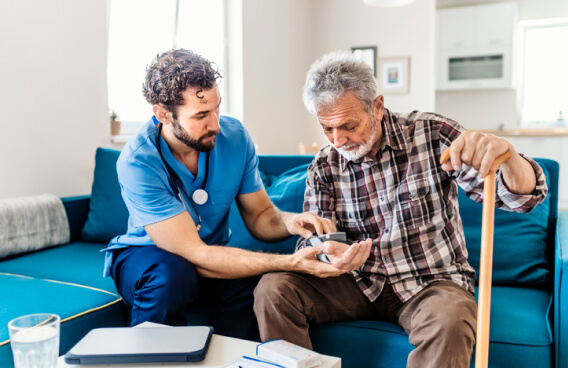 Doctor assisting a patient