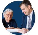 attorney looking through court documents with a client