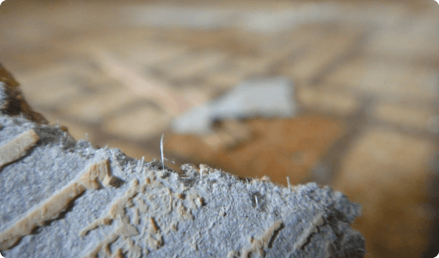 closeup of diy asbestos floor removal