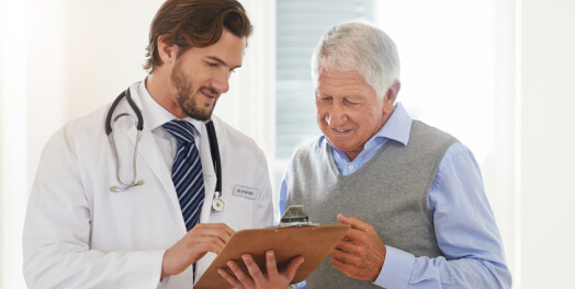 Doctor going over diagnosis with patient
