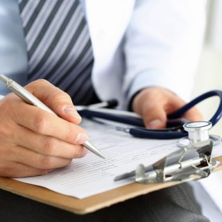 doctor with clipboard