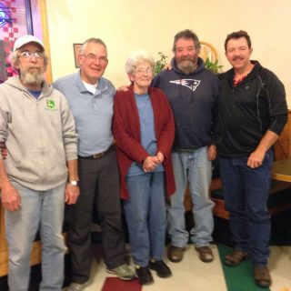 Mesothelioma survivor Emily Ward with her brothers