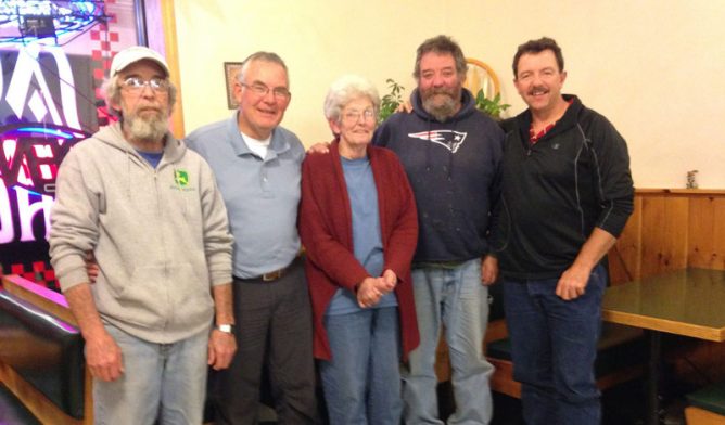 Mesothelioma survivor Emily Ward with her brothers