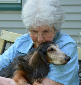 Emily ward holding a dog